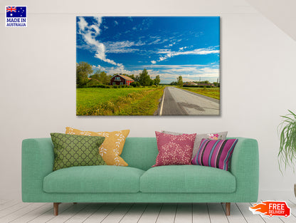 A Rural Road with Grass and Trees under a Cloudy Sky Print 100% Australian Made