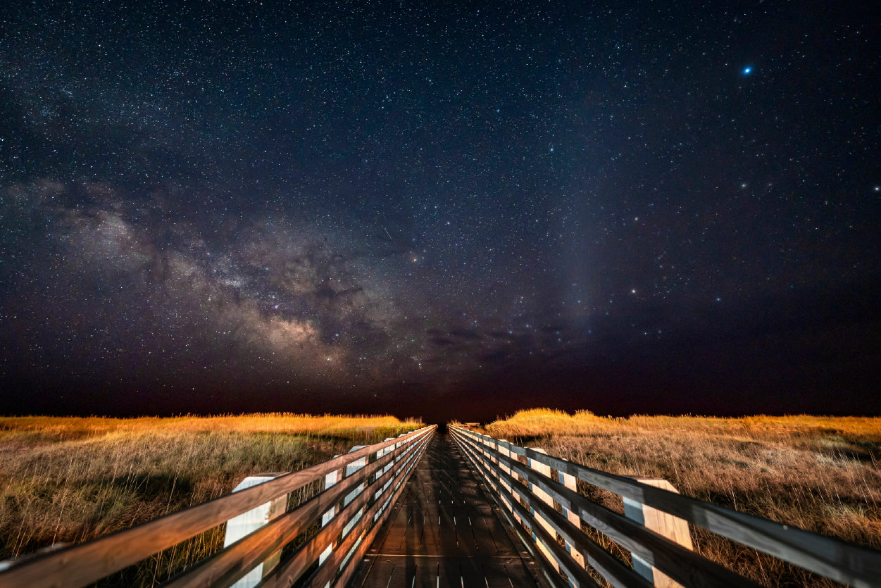 Wooden Bridge across a Meadow under a Starry Sky Print 100% Australian Made