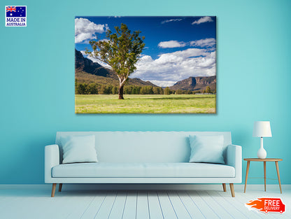 A Cloudy Sky and Mountains with Grass and Meadows Print 100% Australian Made