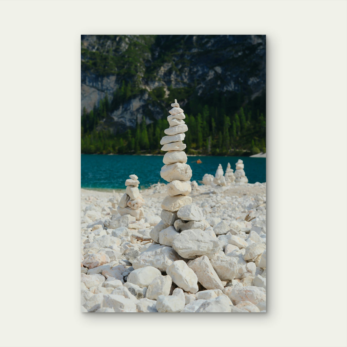 Stack Of White Stones On A Rocky Shore 60x90cm Metal Print Ready to Hang