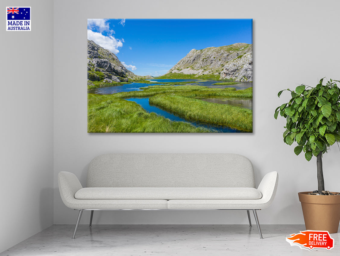 A River Flowing Through a Valley with Mountains Print 100% Australian Made