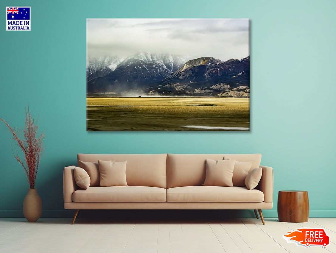 A Field with Mountains, Clouds, Snow, and Grass Print 100% Australian Made