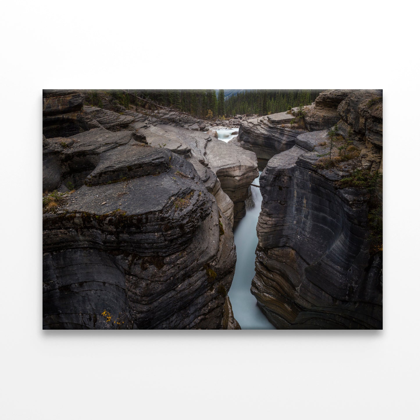 A River Flows through Cascading Over a Rocky Cliff Print 100% Australian Made