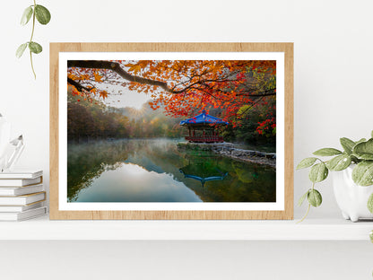 Autumn Leaves On Shore Of The Lake Glass Framed Wall Art, Ready to Hang Quality Print With White Border Oak