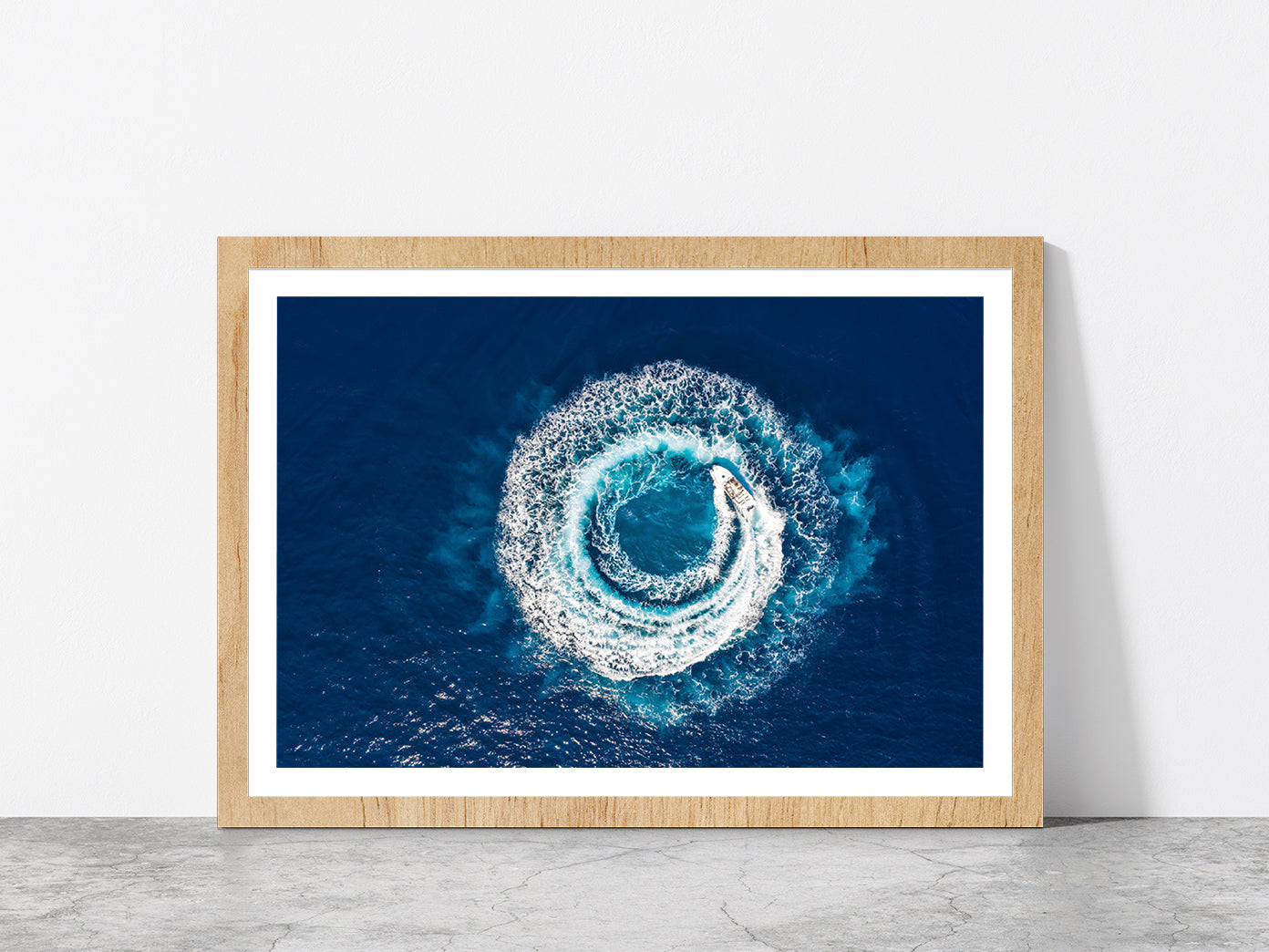 Motorboat Forms A Circle Of Waves Glass Framed Wall Art, Ready to Hang Quality Print With White Border Oak