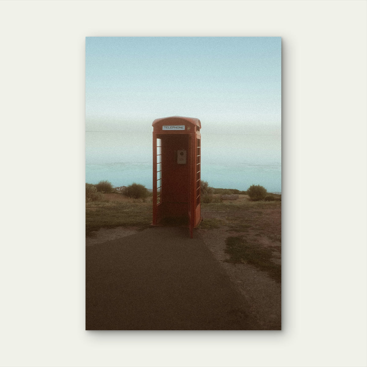 Classic Red British Telephone Booth on Cliff by Ocean 40x60cm Metal Print Ready to Hang
