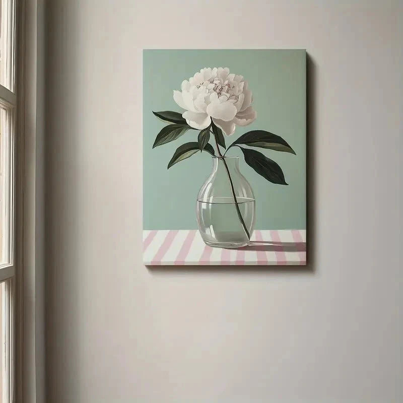 Canvas print of a flower in a vase on a striped table against a light wall.
