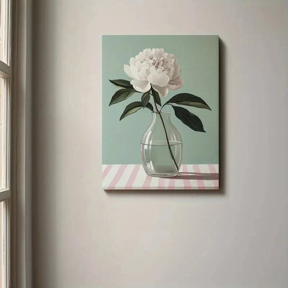 Canvas print of a flower in a vase on a striped table against a light wall.