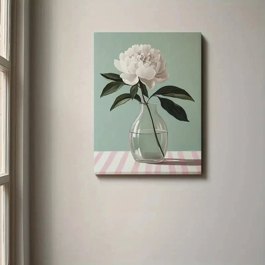 Canvas print of a flower in a vase on a striped table against a light wall.