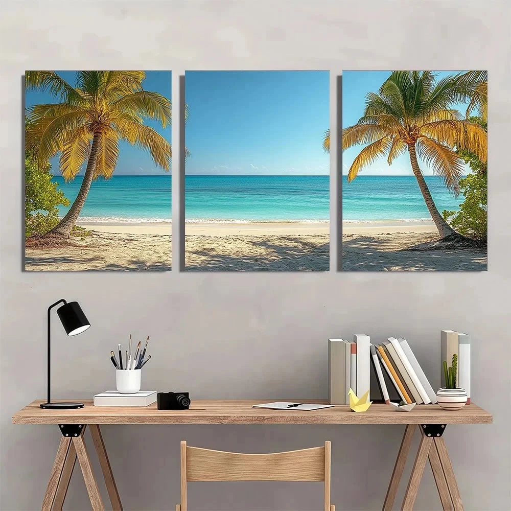 Three beach scene wall art pieces above a desk with office supplies.