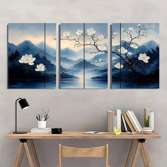 Set of four paintings with floral and mountain scenery above a desk.