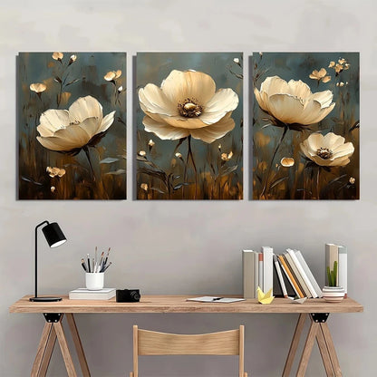 Three floral paintings above a desk with office supplies.