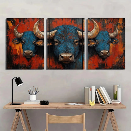Three-panel artwork of a blue bull with orange and red background above a wooden desk.