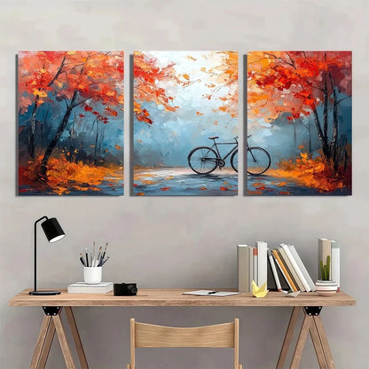 Three-panel abstract painting of a cyclist in an autumnal setting above a desk.