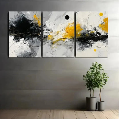 Abstract art triptych with black, yellow, and gray on a wall with two potted plants below.
