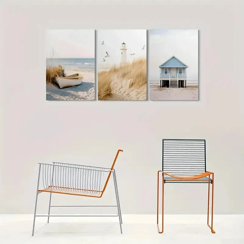Three beach-themed wall art pieces on a wall with two metal chairs below.