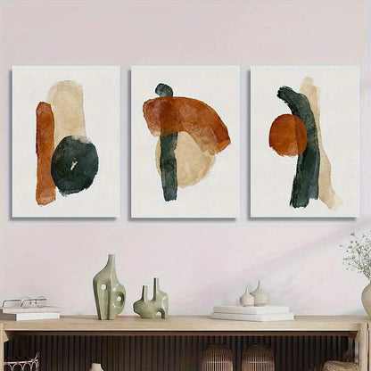 Three abstract art pieces on a wall with decorative items on a shelf below.