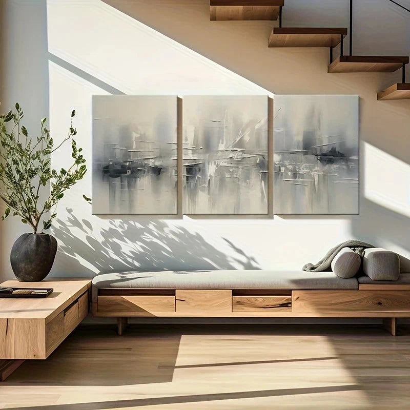 Modern living room with wooden furniture, abstract wall art, and a plant.