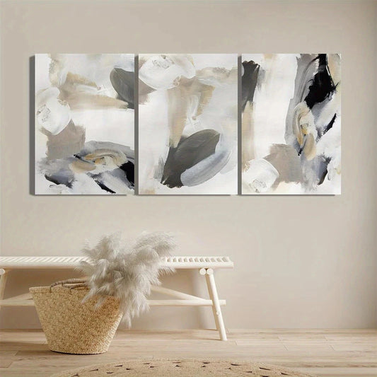 Abstract art triptych on a wall with a woven basket and decorative item below.