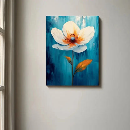 Painting of a white flower with orange accents on a blue background, hanging on a wall.