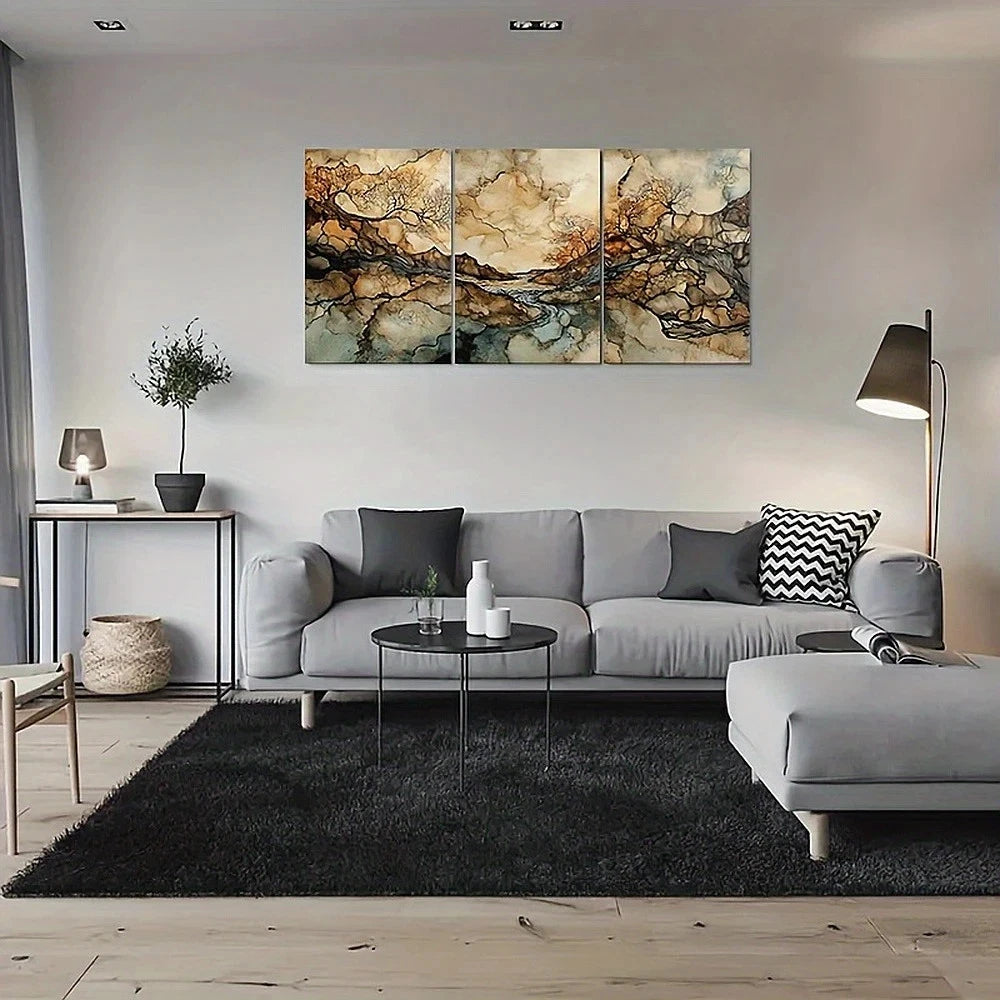 Modern living room with a gray sectional sofa, abstract wall art, and decorative items.