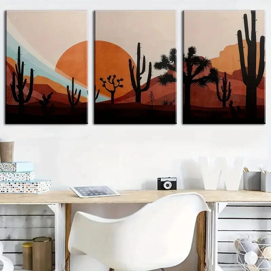 Three desert-themed wall art pieces above a desk with a white chair.