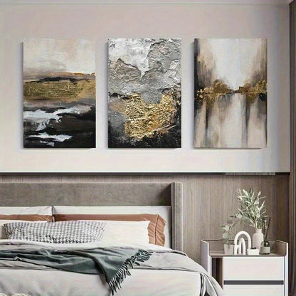 Three abstract paintings above a bed in a bedroom setting.