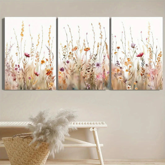 Three-panel wall art of floral design on a white wall with a decorative chair and basket in the foreground.