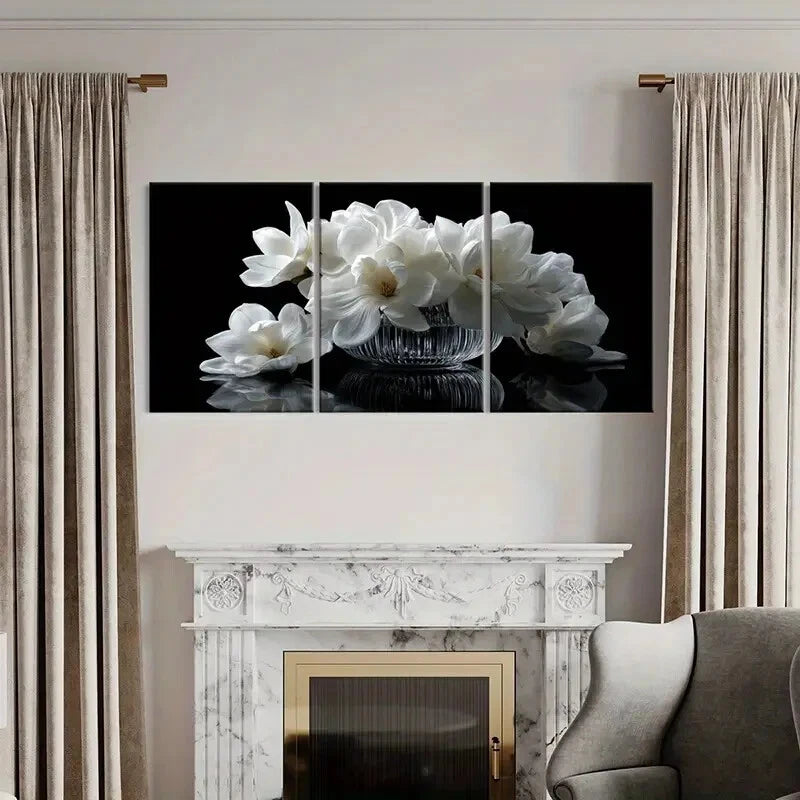 Multiframe wall art of white flowers above a fireplace with curtains and sofa.