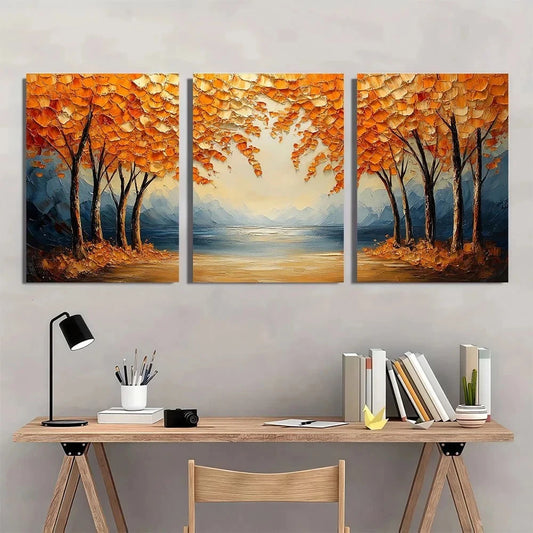Three-panel painting of autumn trees over a lake on a wall above a desk.