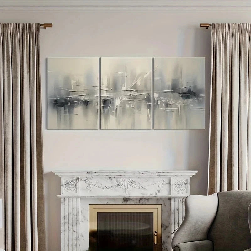 Abstract wall art above a fireplace with curtains on either side