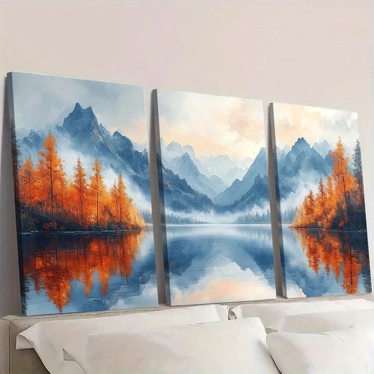 Three-panel wall art of a mountain landscape with trees and water.