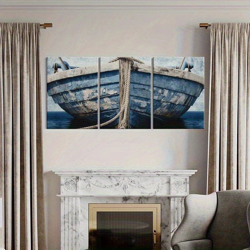 Triptych painting of a blue boat hanging above a fireplace in a living room.