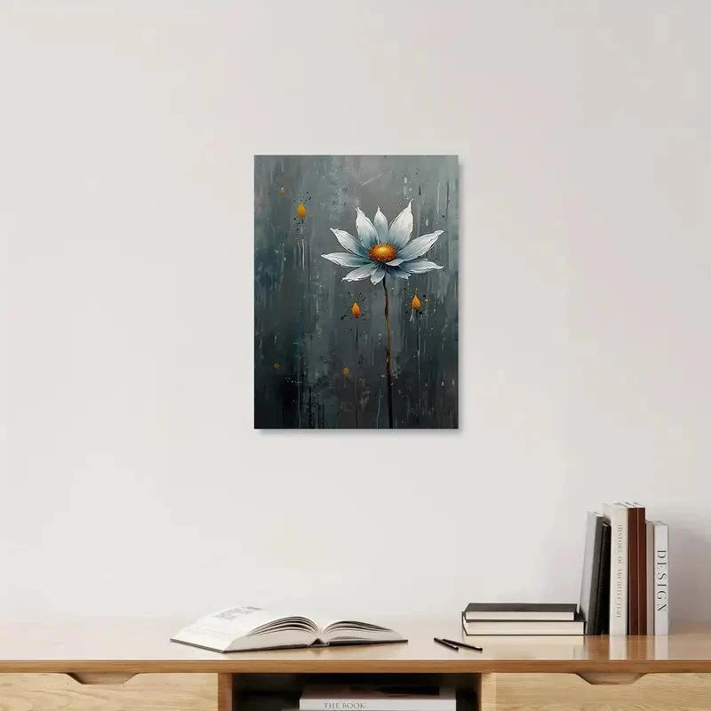 Decorative wall art of a flower on a gray background above a wooden shelf with books.