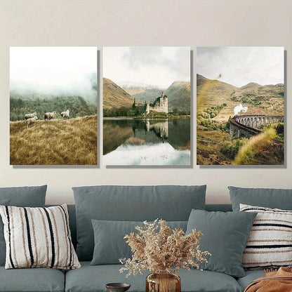 Three framed landscapes above a sofa with decorative pillows and a vase.
