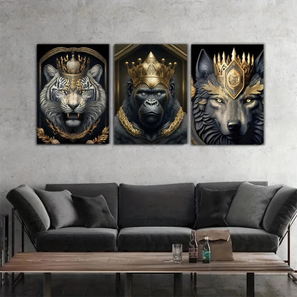 Three framed artworks of a tiger, gorilla, and wolf with crowns on a wall above a gray sofa.
