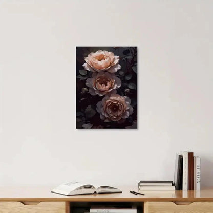 Framed artwork of roses on a wall above a wooden shelf with books.
