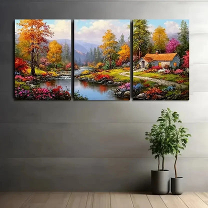 Three-panel canvas print of a colorful autumn landscape with a house, trees, and flowers on a gray wall.