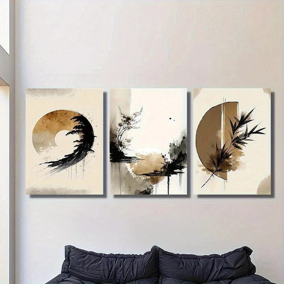 Three abstract art pieces on a wall above a sofa.