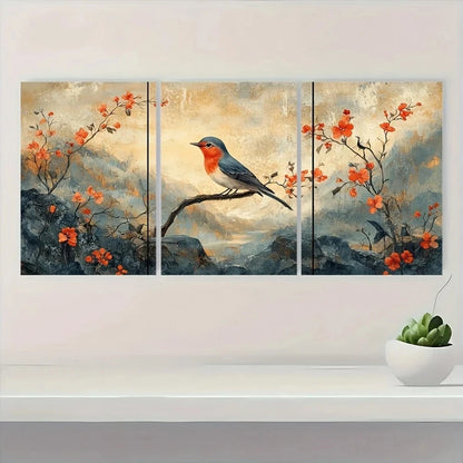 Triptych painting of a bird on a branch with flowers, displayed on a wall above a shelf with a plant.