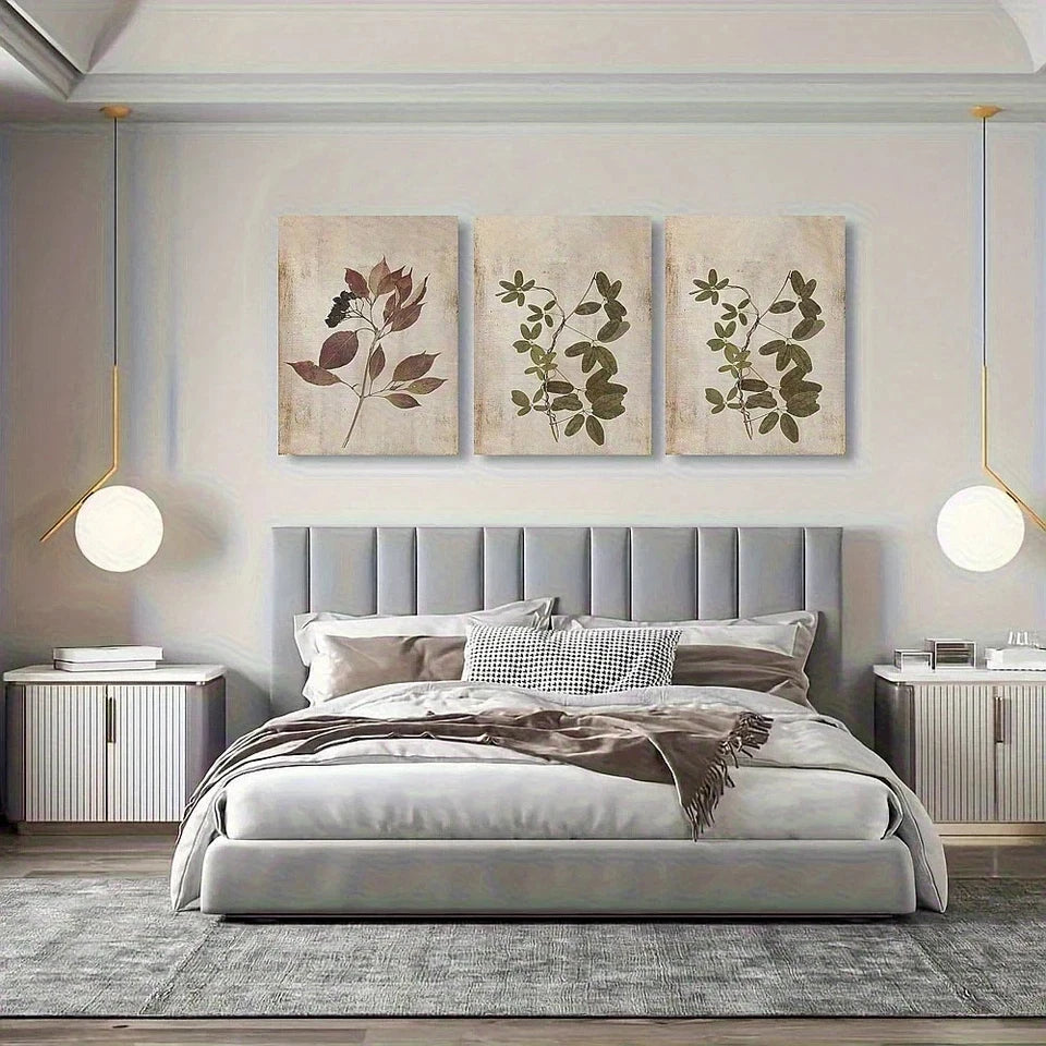 Modern bedroom with a gray upholstered bed, decorative wall art, and pendant lights.