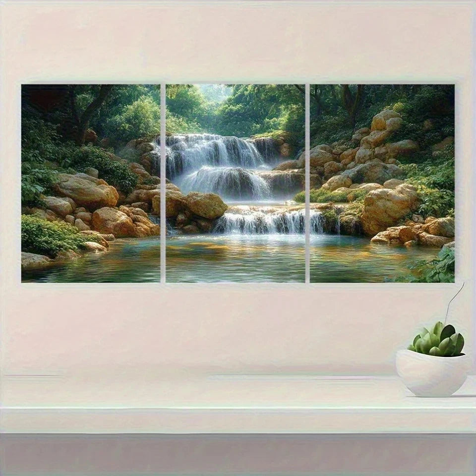 Window view of a waterfall in a forest with a decorative shelf and plant.
