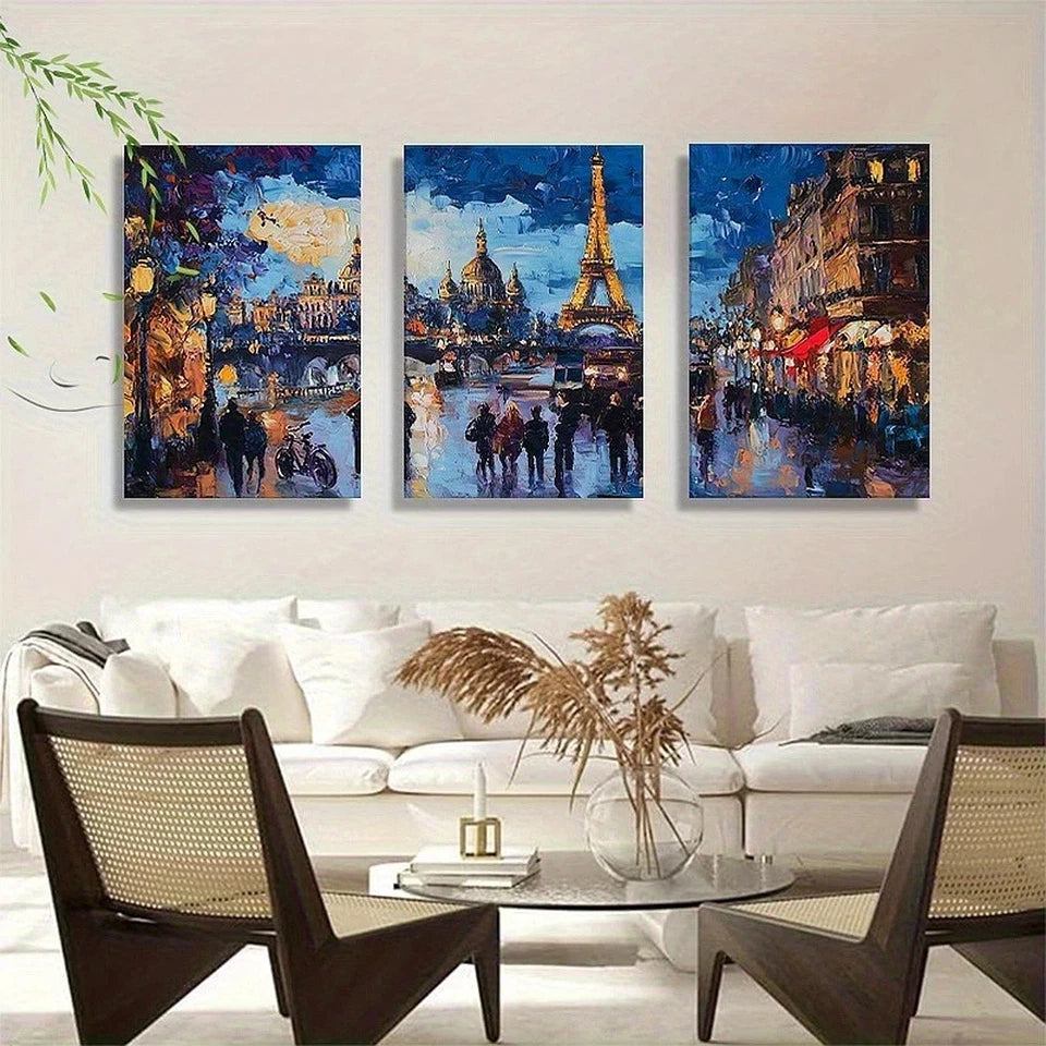 Three colorful cityscape paintings above a white sofa in a living room.