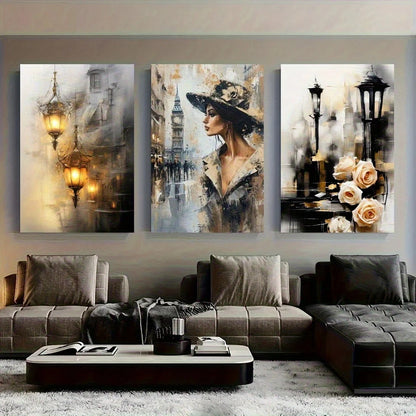 Three artistic wall paintings above a modern sofa in a living room.