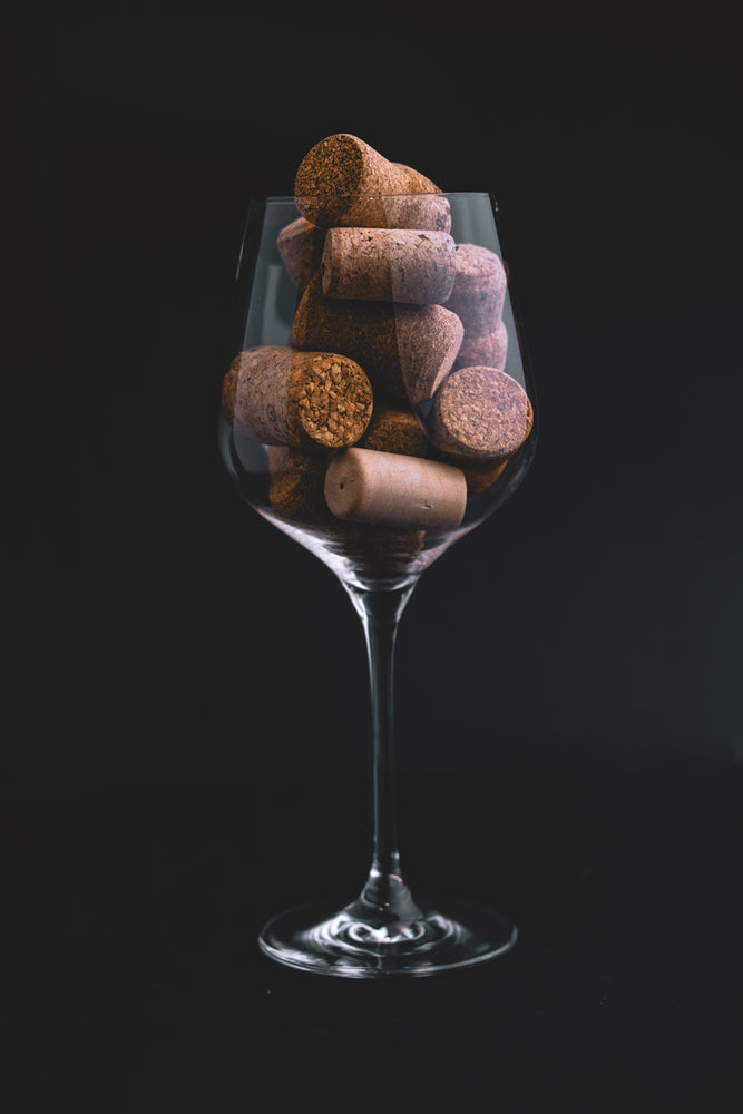 Glass Filled with Corks on Dark View Photograph Print 100% Australian Made